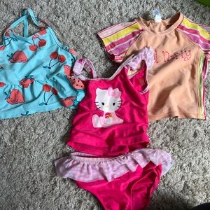 Hello kitty two piece and 2 swim tops